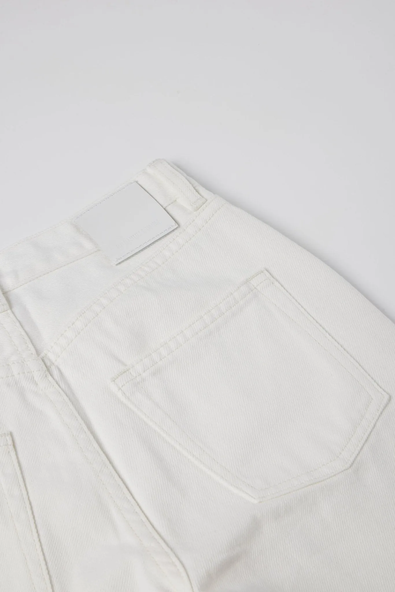 Original twisted high-rise straight-leg jeans (White)